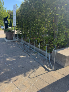 This bike rack is in front of the visitor centre in the arrival courtyard. A bike rack in fron of the visitor centre in the arrival courtyard at Toronto Botanical Garden